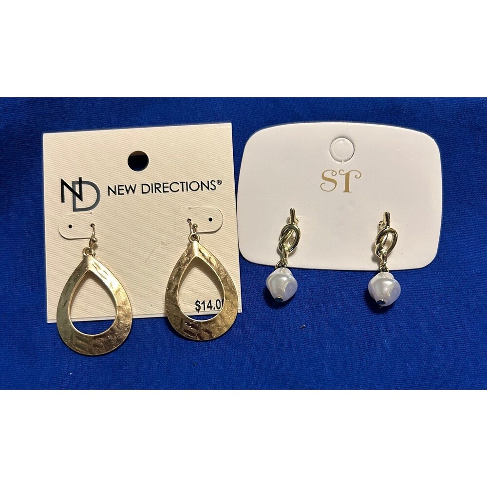 2 pairs of New earrings 1 pair is gold and silver 1 pair is white pearl